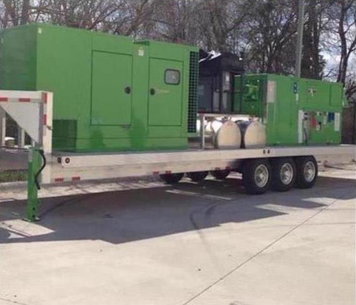 green servpro equipment on a flatbed 
